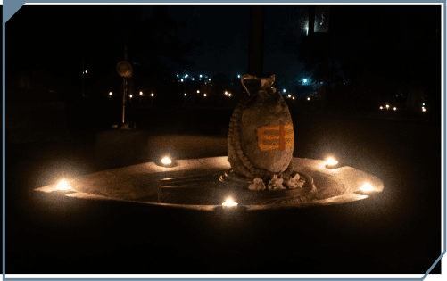 The Swayambhu lingam ringed with lamps at night