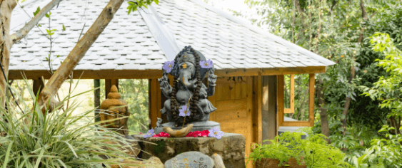 A shrine among the trees at Saadho Ashram
